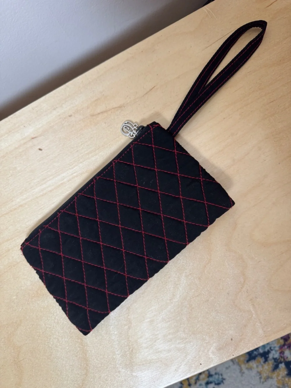 Vera Bradley black wristlet with red stitching, OS